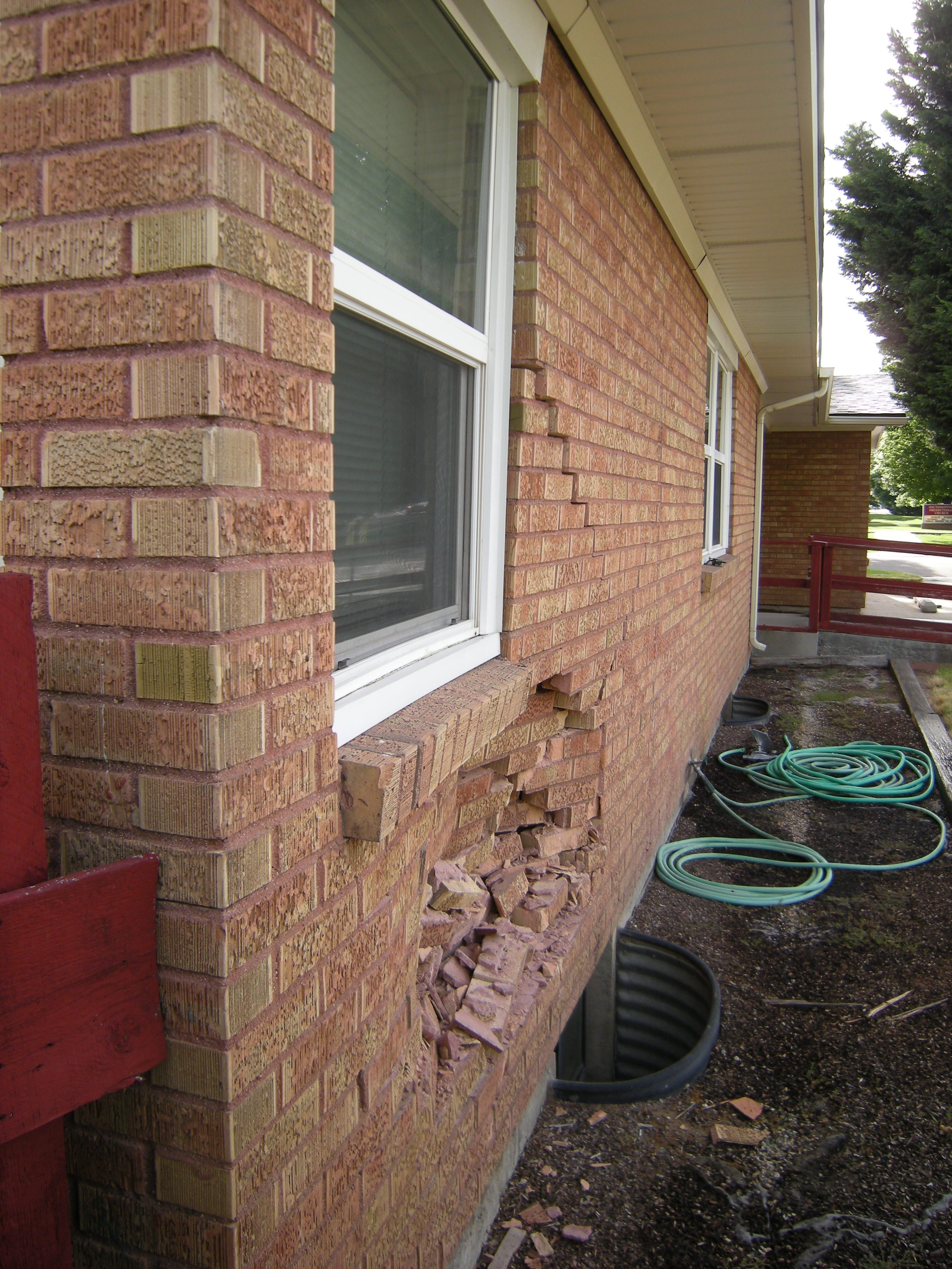 Car into brick building Home Remodeling Boise, Idaho