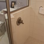 Shower valve on opposite wall